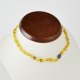 Teething amber necklace with dark blue pearls